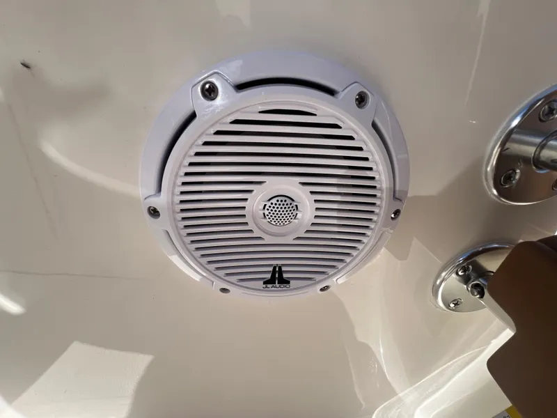 Slide: The Image of White JL Audio speaker on 2026 Pioneer 180 Islander boat. - 22