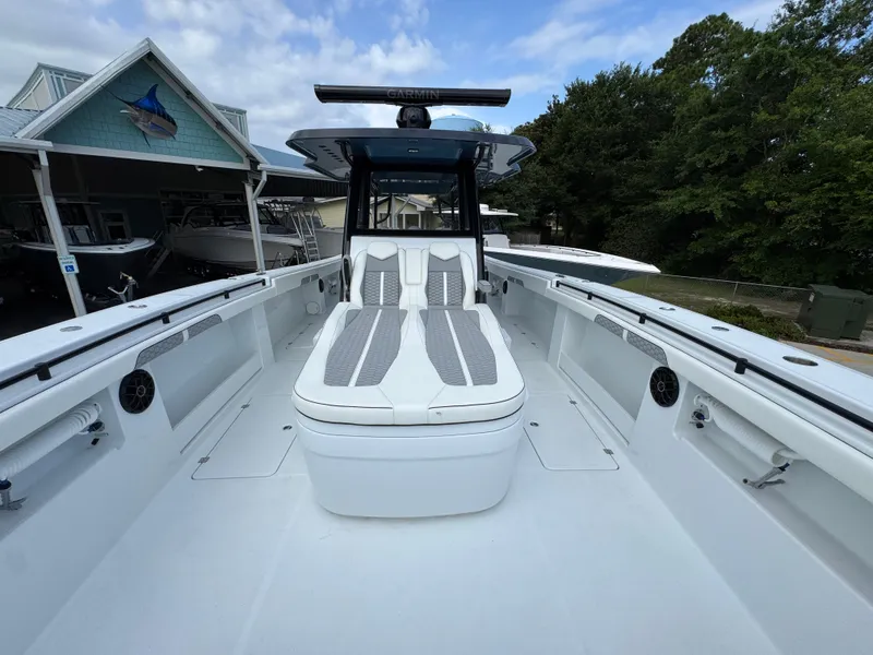 Slide: The Image of 2026 Invincible 46 Catamaran with sleek deck design and comfortable seating. - 21