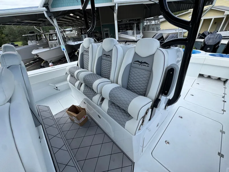 Slide: The Image of Luxury seating on 2026 Invincible 46 Catamaran, featuring sleek design and premium materials. - 33