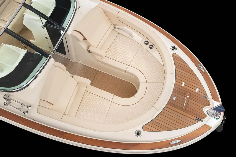 Slide: The Image of Manufacturer Provided Image: 2023 Chris-Craft Launch 31 GT boat interior with luxurious seating and teak accents. - 6