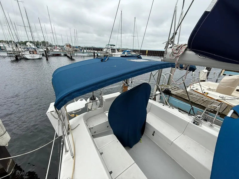 Slide: The Image of Catalina 36 MkII sailboat, 2000 model, docked at marina with blue canopy. - 10