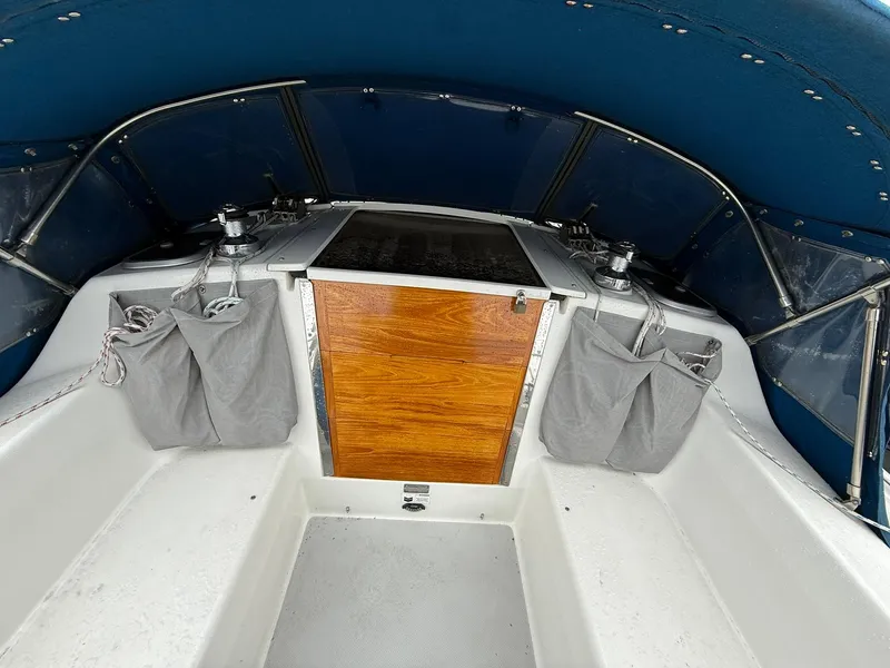 Slide: The Image of Interior of a 2000 Catalina 36 MkII sailboat cockpit with blue canopy. - 11