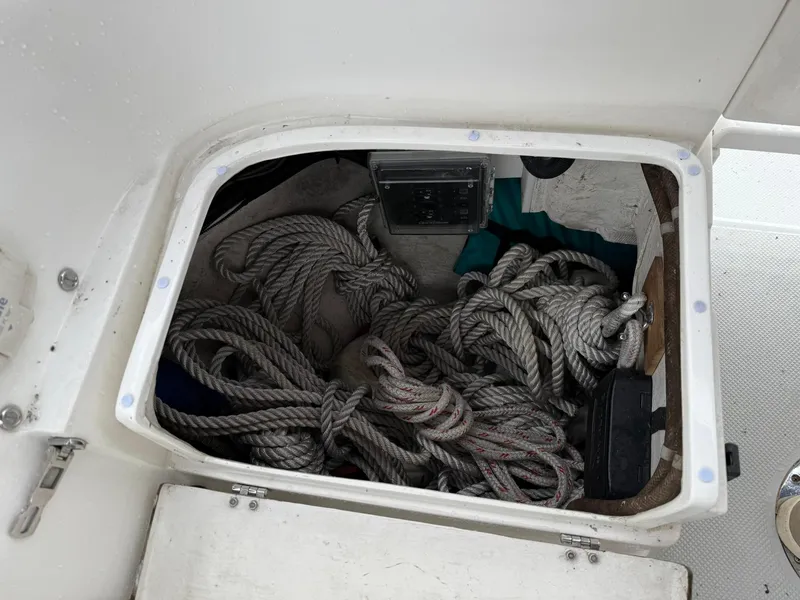 Slide: The Image of Storage compartment with ropes on a 2000 Catalina 36 MkII sailboat. - 13