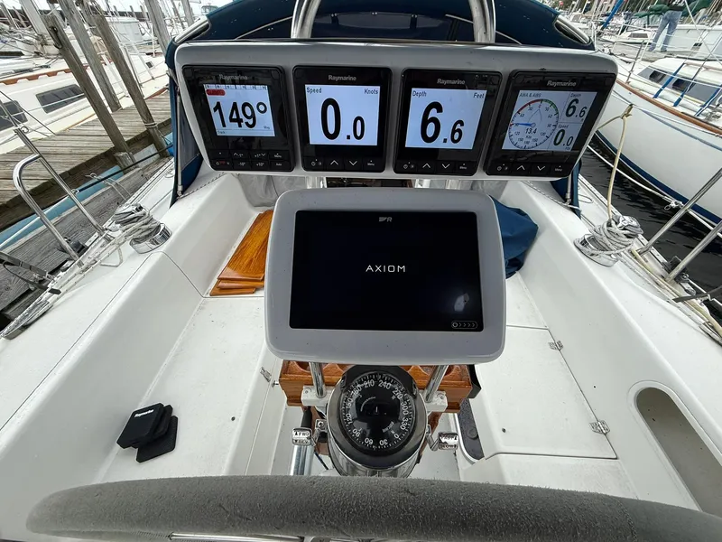 Slide: The Image of Cockpit of 2000 Catalina 36 MkII sailboat with navigation instruments and compass. - 23