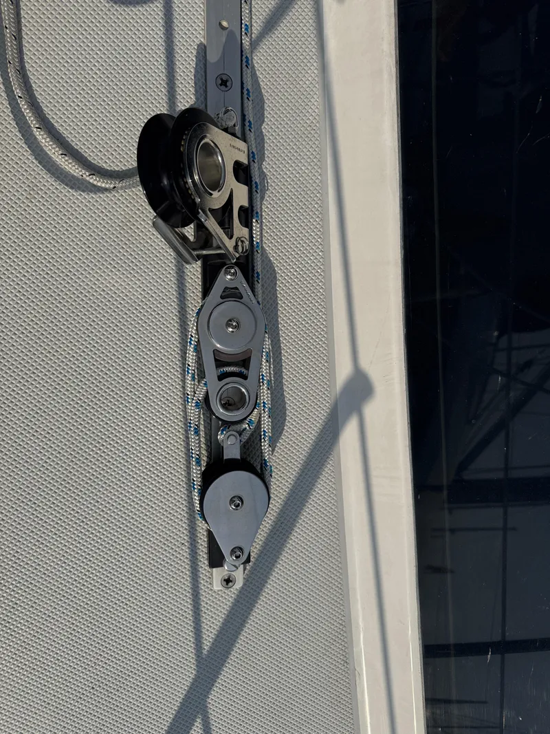 Slide: The Image of Pulley system on a 2000 Catalina 36 MkII sailboat, featuring rigging and hardware. - 29