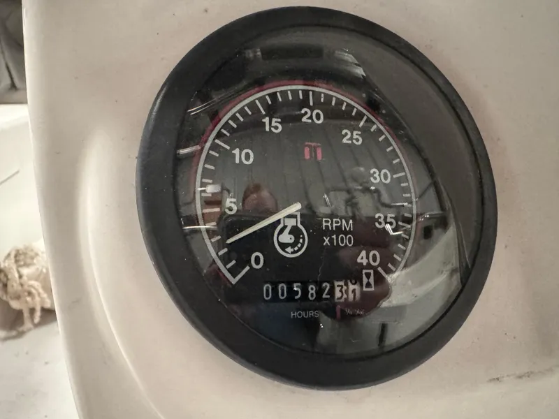 Slide: The Image of Tachometer of 2000 Catalina 36 MkII sailboat showing RPM and engine hours. - 30
