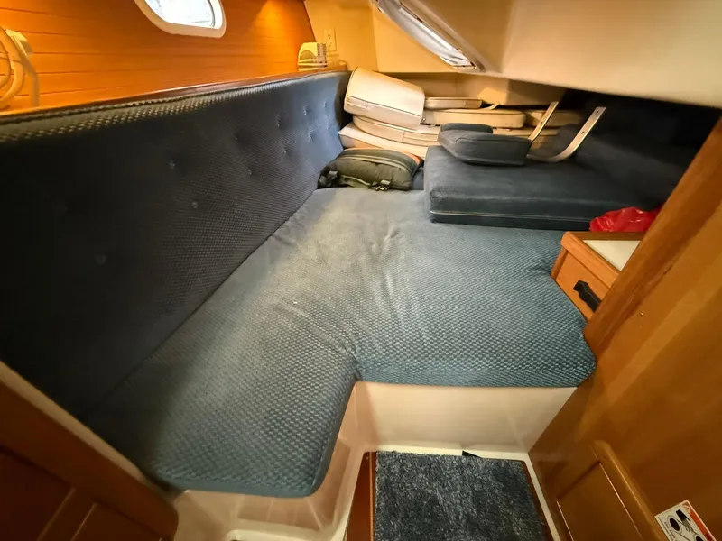 Slide: The Image of Cozy interior cabin of a 2000 Catalina 36 MkII sailboat with blue upholstery. - 47