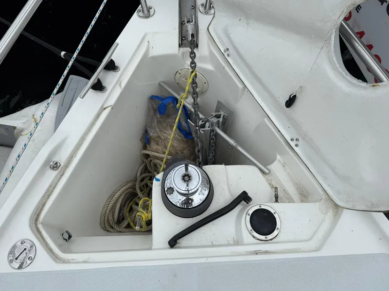Slide: The Image of Anchor locker of a 2000 Catalina 36 MkII sailboat with ropes and chain. - 9
