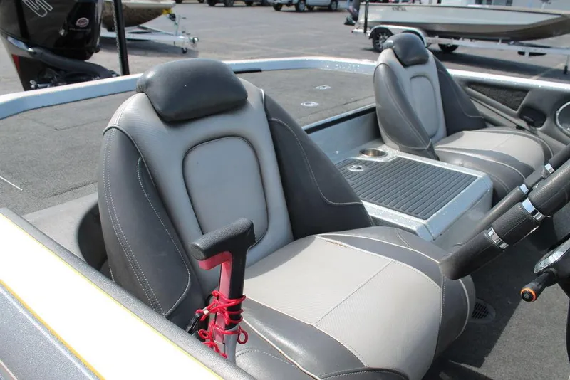 Slide: The Image of 2017 Ranger Z520C boat interior with gray seats and steering wheel. - 3