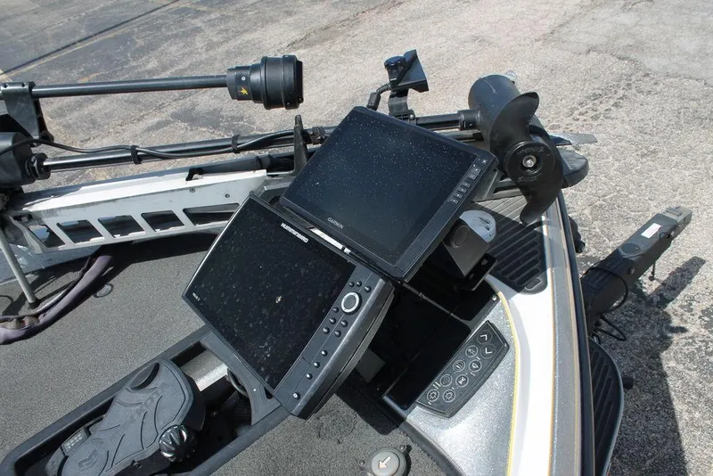 Slide: The Image of 2017 Ranger Z520C boat dashboard with dual fish finders and control panel. - 7