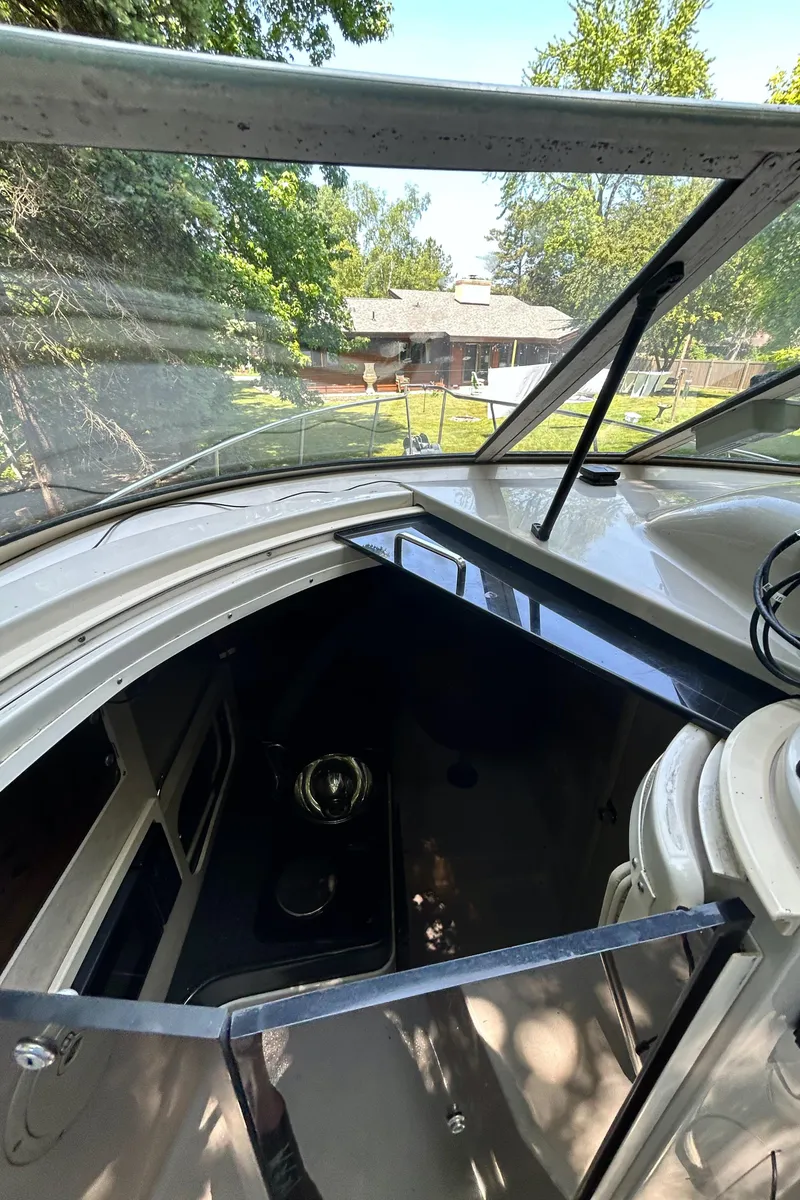 Slide: The Image of 1995 Donzi 255 Medallion boat interior with open cabin door. - 4