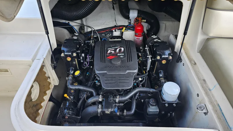 Slide: The Image of Engine compartment of a 2005 Sea Ray 220 Sundeck with MerCruiser 5.0 MPI engine. - 20