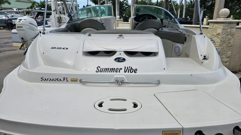 Slide: The Image of 2005 Sea Ray 220 Sundeck boat with "Summer Vibe" text, Sarasota, FL. - 3