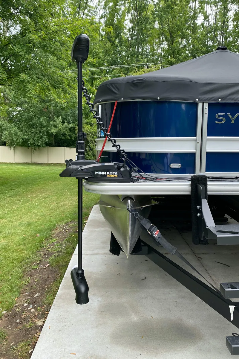 Slide: The Image of 2022 Sylvan L3 Party Fish pontoon boat with Minn Kota trolling motor. - 16