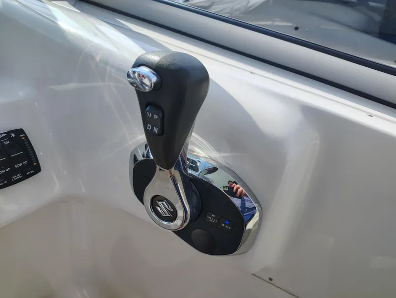 Slide: The Image of Close-up of 2023 Key West 239 DFS boat throttle control lever. - 20