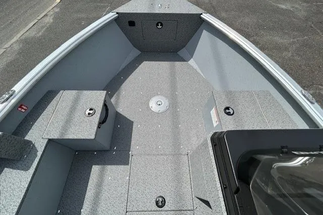 Slide: The Image of 2025 Lund 1875 Alaskan SS boat interior, featuring spacious deck and storage compartments. - 5