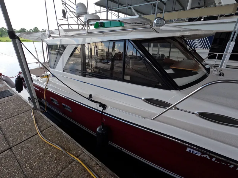 Slide: The Image of 2020 Cutwater C-30 Sedan docked, showcasing sleek design and modern features. - 10