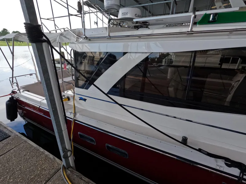 Slide: The Image of 2020 Cutwater C-30 Sedan docked, showcasing sleek design and modern features. - 11