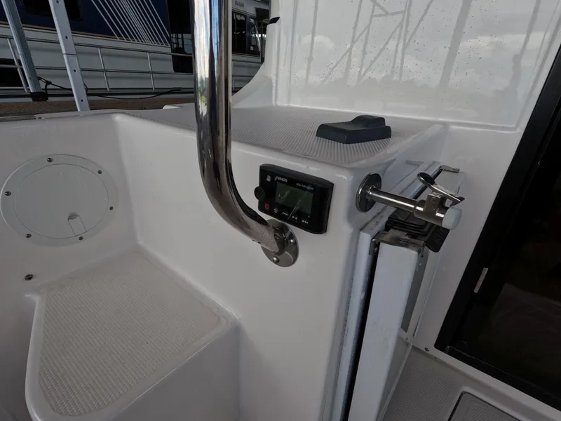 Slide: The Image of 2020 Cutwater C-30 Sedan boat interior with control panel and seating area. - 30