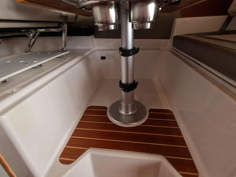 Slide: The Image of 2020 Cutwater C-30 Sedan interior with wood accents and metal fixtures. - 41