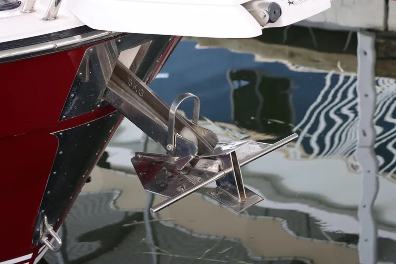 Slide: The Image of Anchor of 2020 Cutwater C-30 Sedan boat reflecting on water. - 7