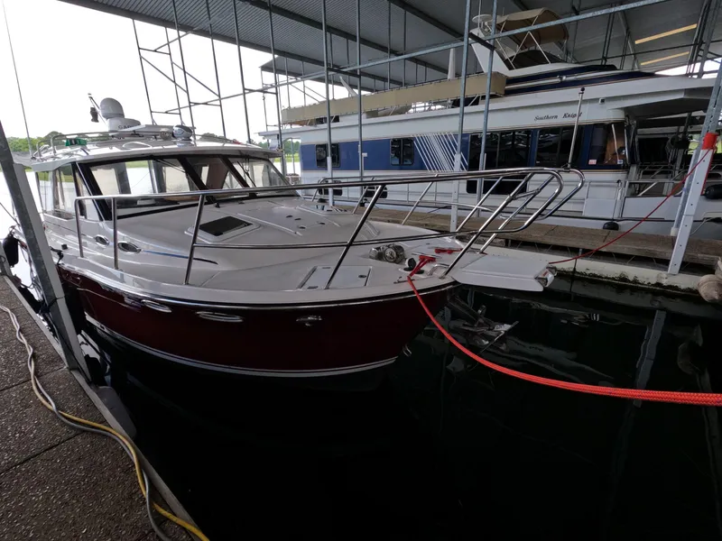 Slide: The Image of 2020 Cutwater C-30 Sedan docked in a covered marina. - 8