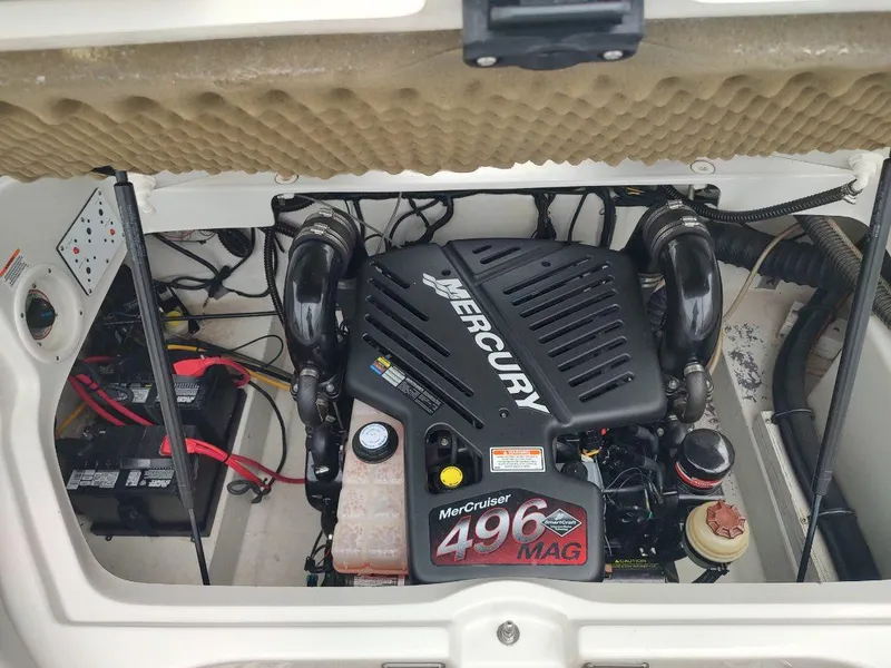 Slide: The Image of 2005 Crownline 270 BR boat engine compartment with Mercury MerCruiser 496 MAG engine. - 22