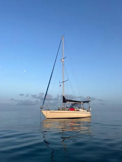 The Image of Sailboat Maxi 35 CC 1990 on calm sea under clear blue sky. - 0