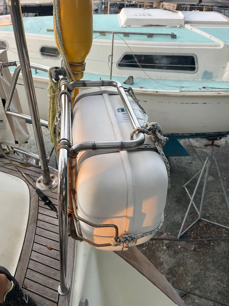 Slide: The Image of Sailboat deck with life raft, Maxi 35 CC, 1990 model. - 34