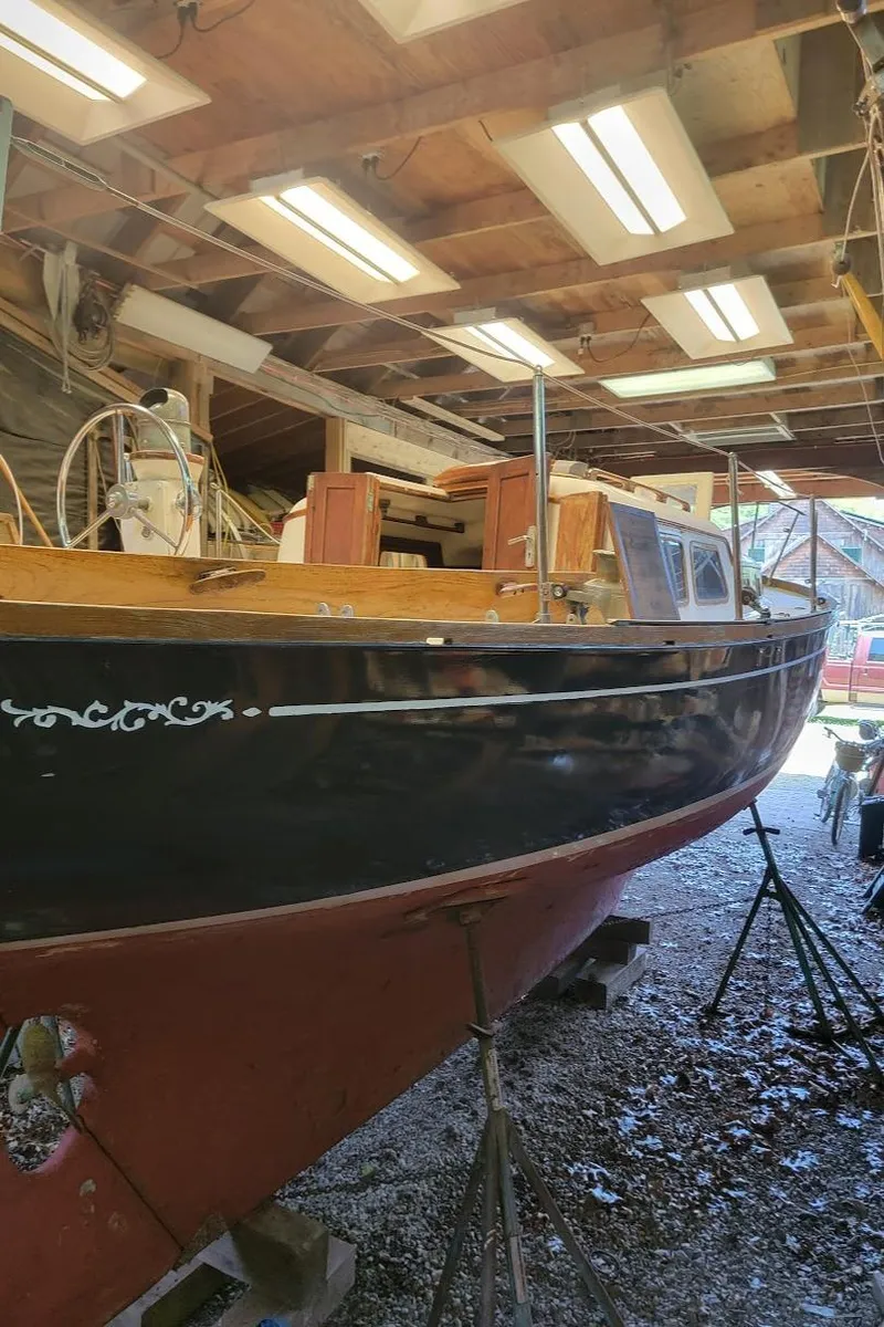 Slide: The Image of 1968 Cheoy Lee Herreshoff 31 Offshore Ketch in a boatyard, under maintenance. - 48
