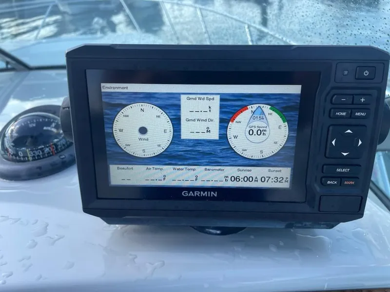 Slide: The Image of Garmin marine display on 2007 Formula 31 Cruiser, showing wind speed and direction. - 24