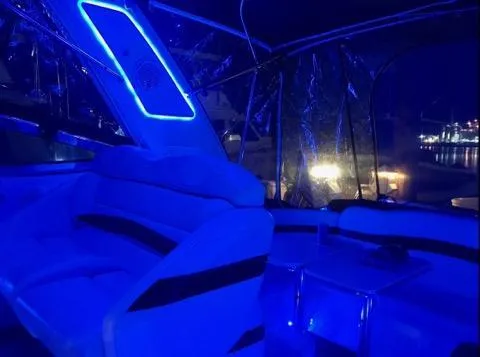 Slide: The Image of 2007 Formula 31 Cruiser interior with blue ambient lighting at night. - 29