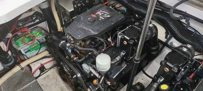 Slide: The Image of Engine compartment of a 2007 Formula 31 Cruiser with visible components and wiring. - 31