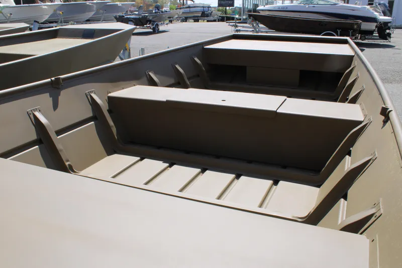 Slide: The Image of 2025 G3 Gator Tough 1448 LW boat interior, showcasing seating and storage compartments. - 4