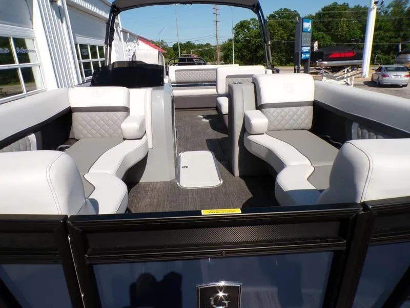 Slide: The Image of 2025 Godfrey AquaPatio 255 SFL iMPACT boat interior with luxurious seating and modern design. - 16