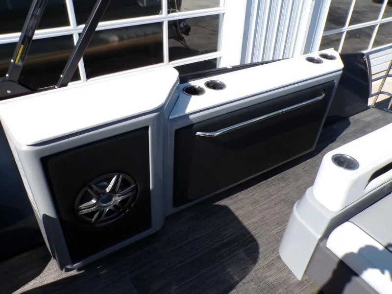 Slide: The Image of Interior of 2025 Godfrey AquaPatio 255 SFL with sleek design and built-in speaker. - 7