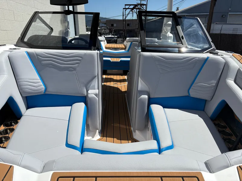 Slide: The Image of 2026 Nautique Super Air Nautique G21 interior with sleek seating and modern design. - 14