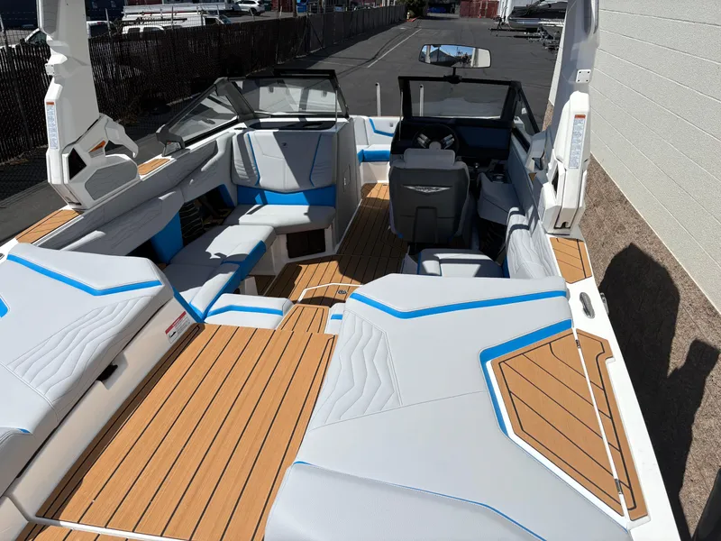 Slide: The Image of 2026 Nautique Super Air Nautique G21 interior with sleek seating and modern design. - 4