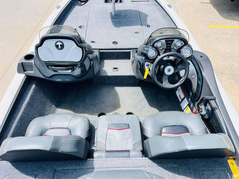 Slide: The Image of 2024 Tracker Pro Team 175 TXW boat interior with dual consoles and seating. - 22