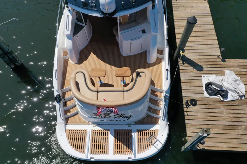Slide: The Image of Aerial view of 2007 Neptunus 55 Cabrio yacht docked at a marina. - 14