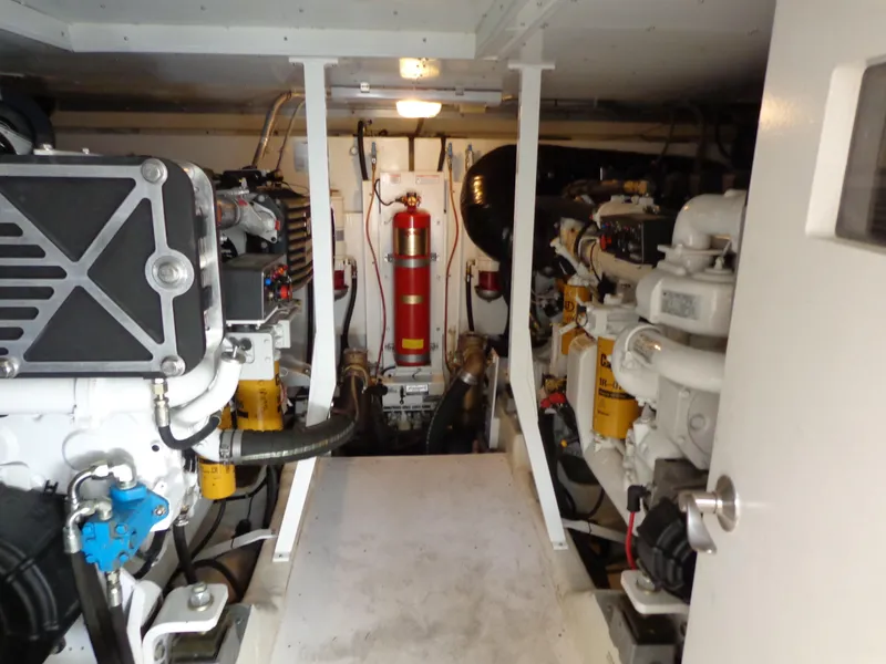 Slide: The Image of Engine room of 2007 Neptunus 55 Cabrio yacht, showcasing mechanical components and systems. - 27