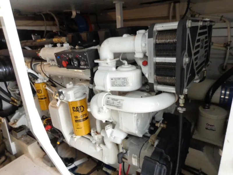 Slide: The Image of Engine room of 2007 Neptunus 55 Cabrio yacht, featuring CAT components and machinery. - 29