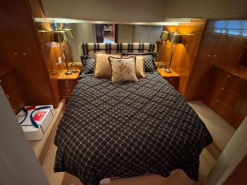 Slide: The Image of Luxurious bedroom interior of 2007 Neptunus 55 Cabrio yacht with elegant bedding and lighting. - 35