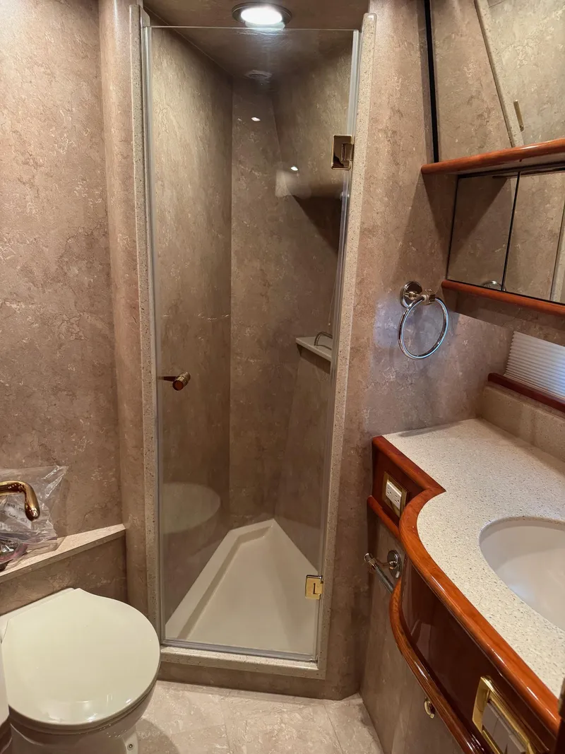 Slide: The Image of Luxurious bathroom in 2007 Neptunus 55 Cabrio yacht with shower and vanity. - 42