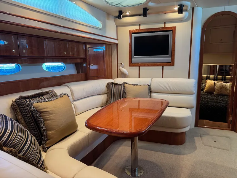 Slide: The Image of Luxurious interior of 2007 Neptunus 55 Cabrio yacht with plush seating and elegant decor. - 43