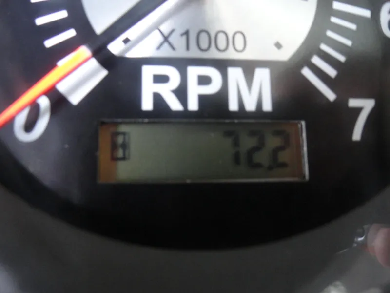 Slide: The Image of Close-up of Chaparral 23 SSi 2020 RPM gauge displaying 72.2 hours. - 9