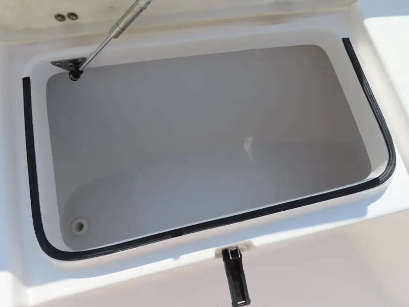 Slide: The Image of Open storage compartment on a 2018 Sea Fox 226 Commander boat. - 11