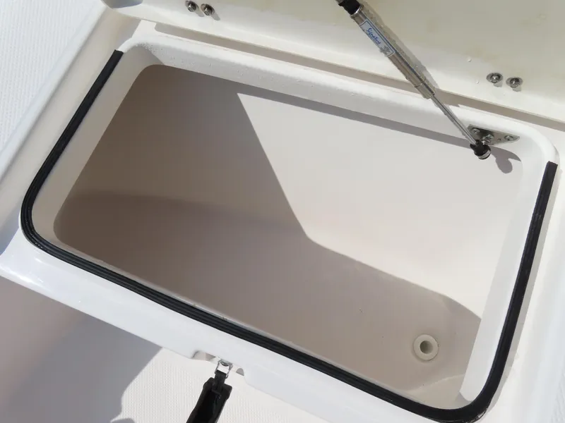 Slide: The Image of Open storage compartment on a 2018 Sea Fox 226 Commander boat. - 12