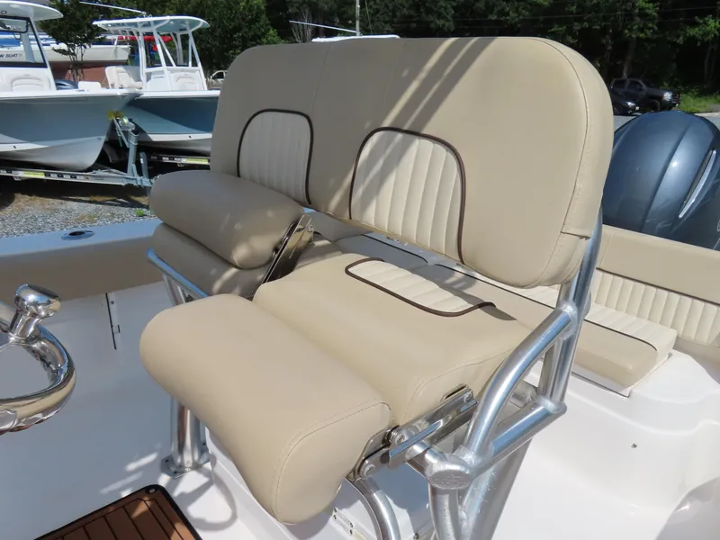 Slide: The Image of Beige seating on 2018 Sea Fox 226 Commander boat, featuring stainless steel frame. - 23
