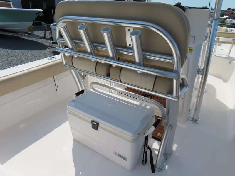 Slide: The Image of 2018 Sea Fox 226 Commander boat interior with rod holders and cooler. - 24